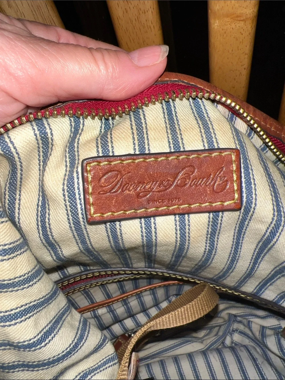 Dooney & Bourke Navy Nylon Messenger Bag with Brown Leather Trim and Red Accents